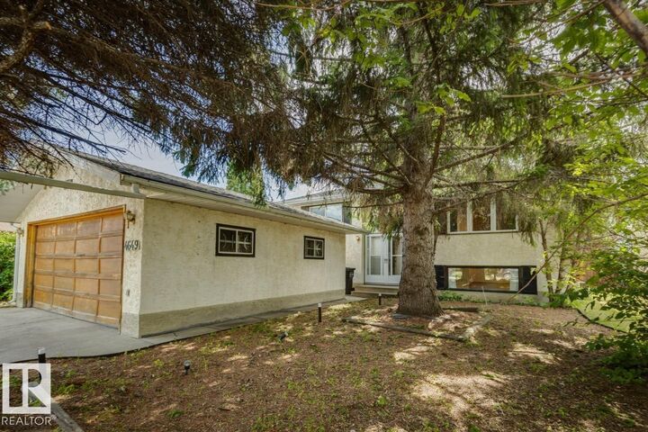 Property Photo: 4649 16A Avenue NW AB T6L 2S3