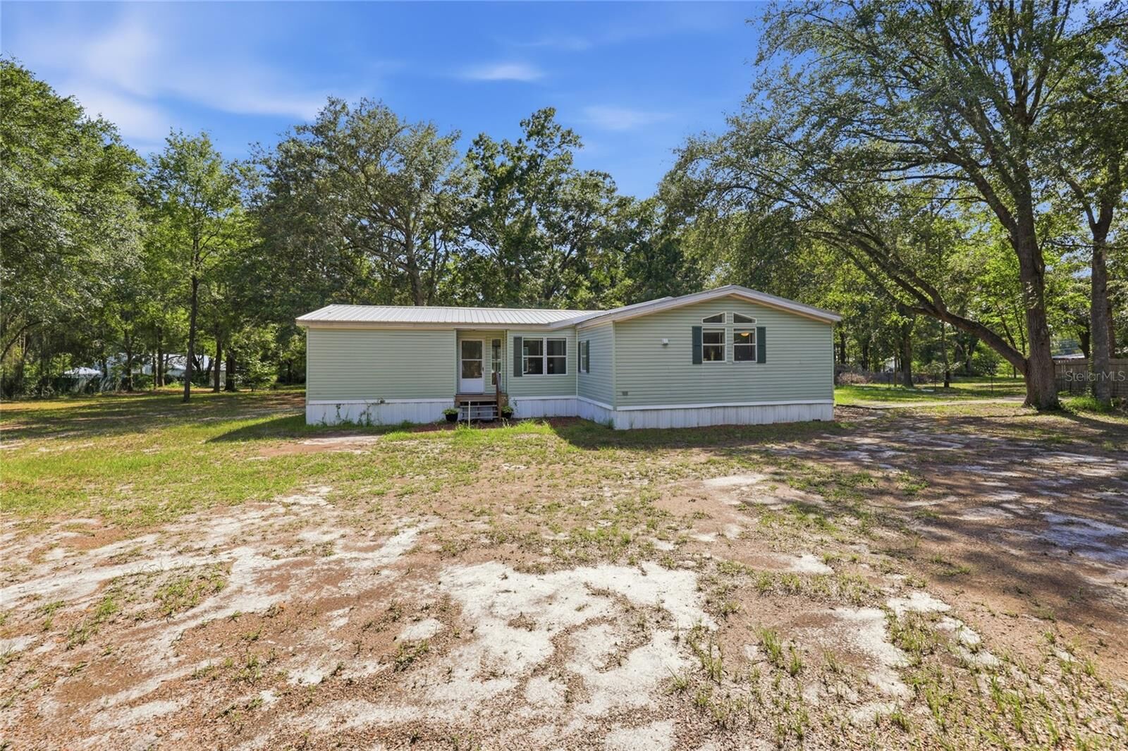 Property Photo: 2876 SE County Road 245 FL 32025