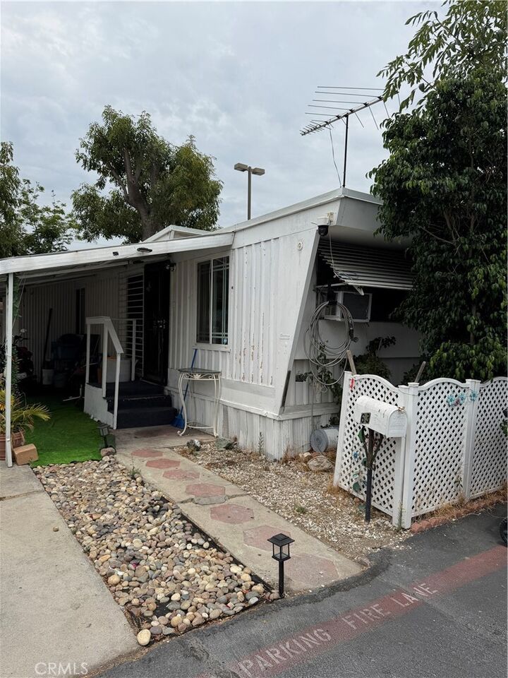 Property Photo:  1850 W Orangethorpe 63  CA 92833 