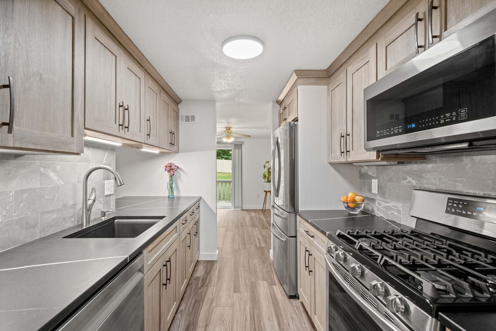 Property Photo:  1H Black Oak Drive  NH 03062 