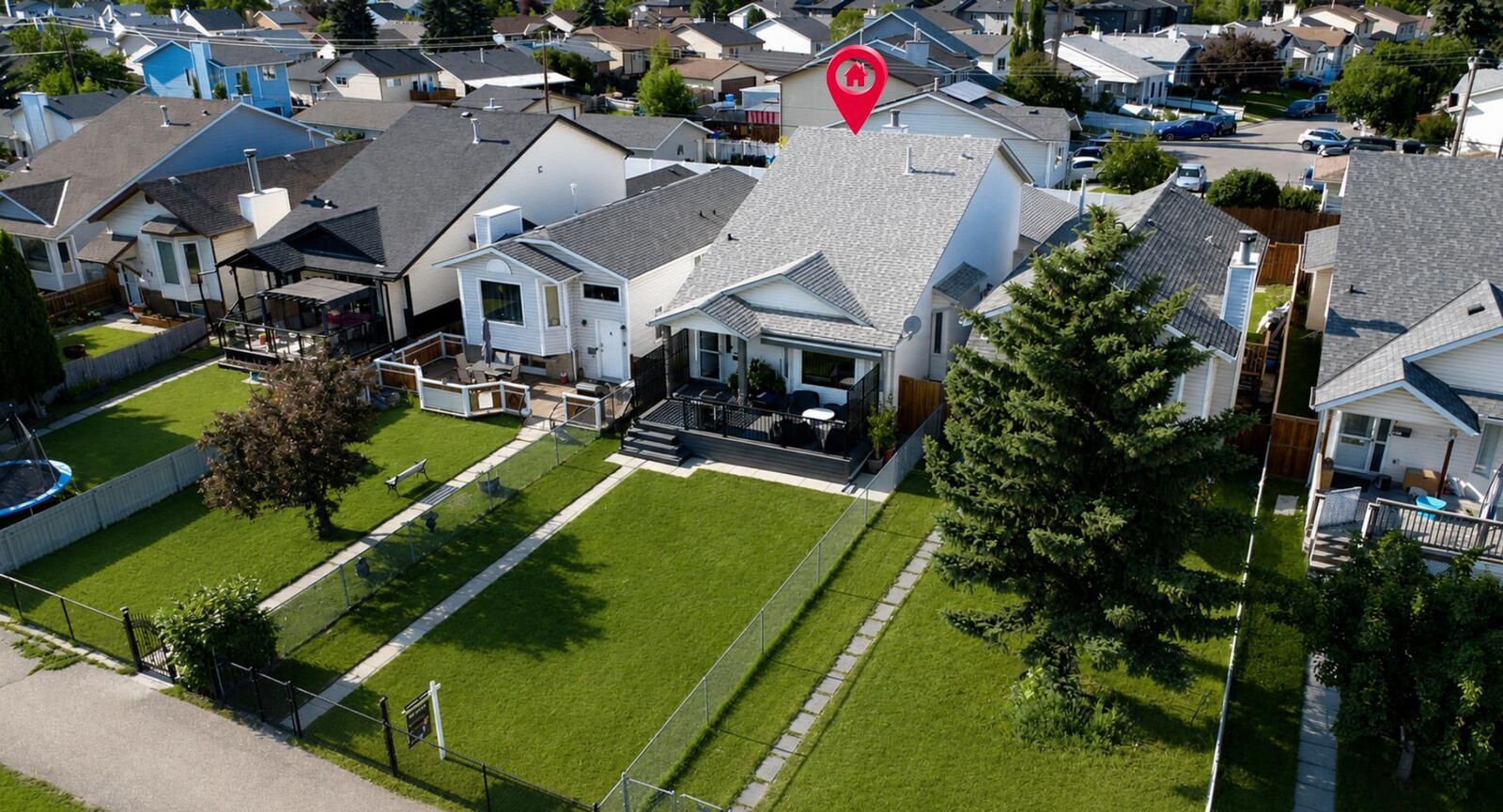 Property Photo: 8 Erin Meadow Way SE AB T2B 3A2