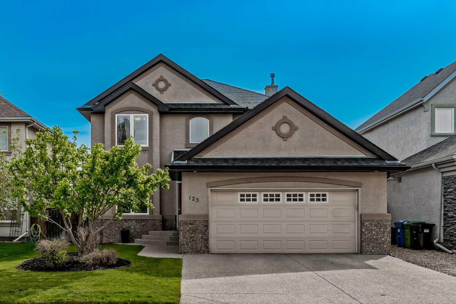 Property Photo: 125 Cranleigh Park SE AB T2M 1H3