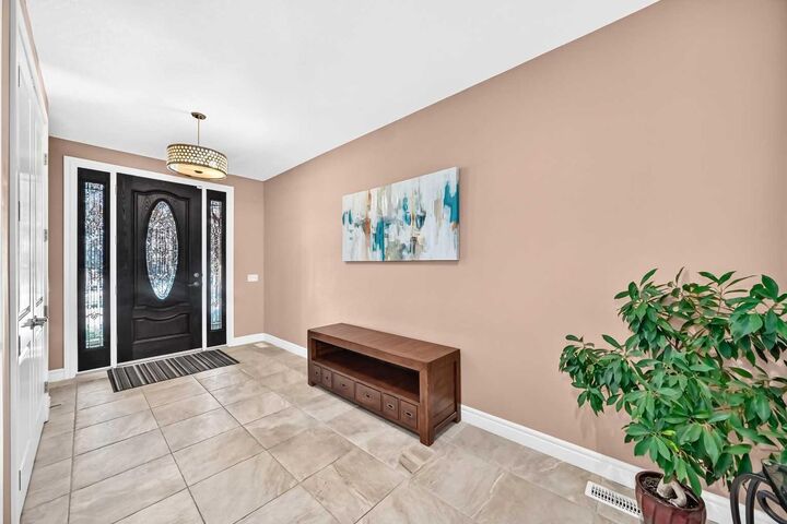 Property Photo:  116 Panatella Rise NW  AB T3K 0W8 