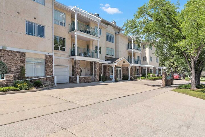 Property Photo: 9449 19 Street SW 108 AB T2V 5J8