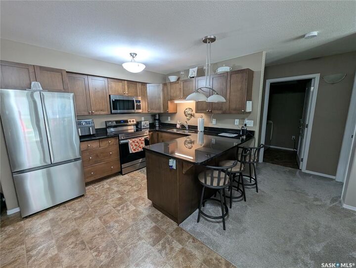 Photo de la propriété:  150 Pawlychenko Lane 111  SK S7V 0B4 