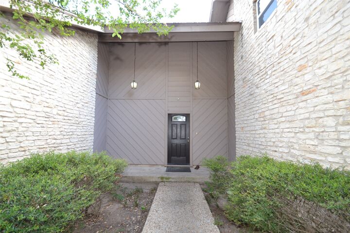 Property Photo: 8833 Tallwood Drive TX 78759