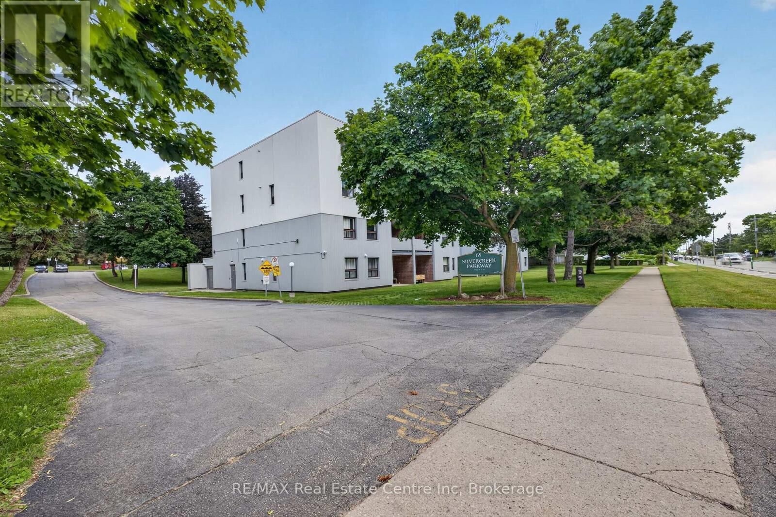 Property Photo: 65 Silvercreek Parkway North 401 ON N1H 7R9