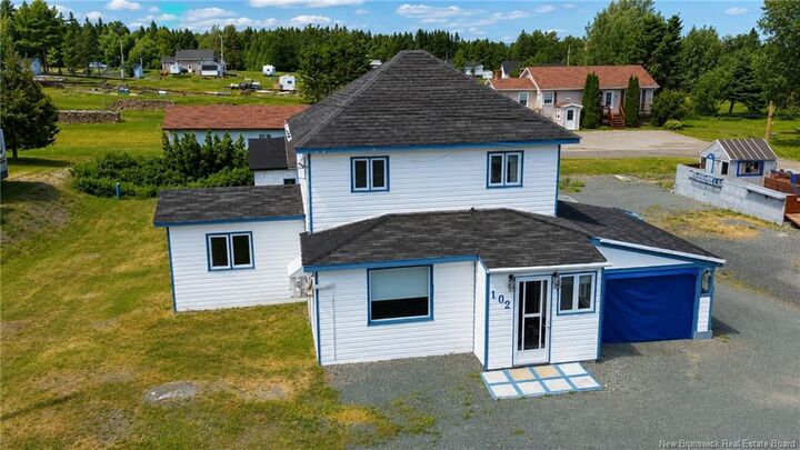 Property Photo:  102 Rue De La Gare  NB E8J 2Z1 