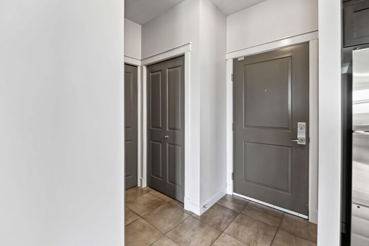 Property Photo: 100 Lakeway Boulevard 324 AB T4S 0A4