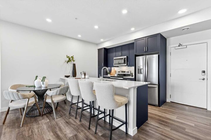 Property Photo: 255 Les Jardins Park SE 303 AB T2C 5W9