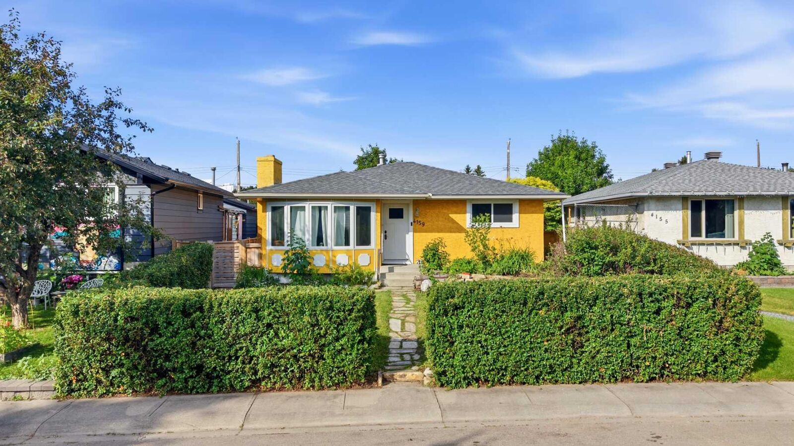 Property Photo: 4159 Doverbrook Road SE AB T2B 1X4