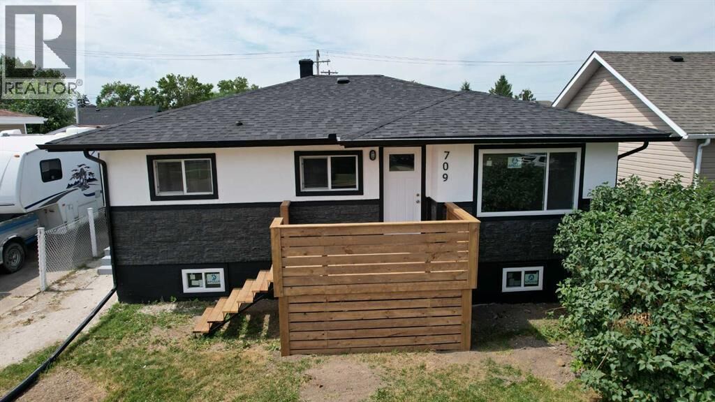 Property Photo: 709 Centre Street AB T0J 1P0
