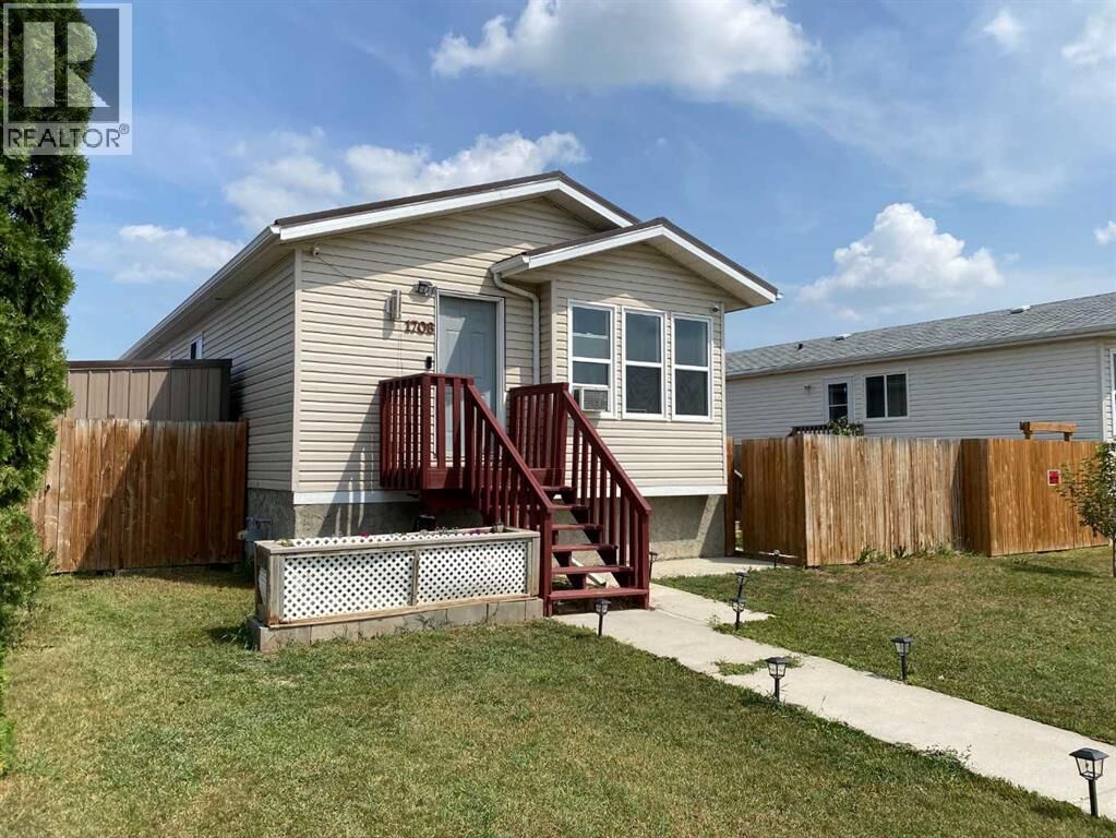 Property Photo:  1708 2 Avenue East  AB T1R 1K3 