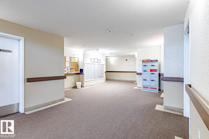 Property Photo: 1320 Rutherford Road SW 101 AB T6W 0B6