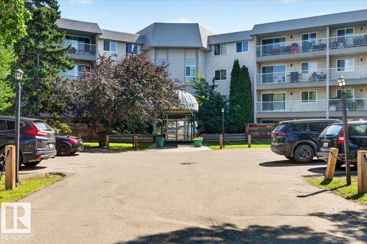 Property Photo: 5125 Riverbend Road NW 406 AB T6H 5K5