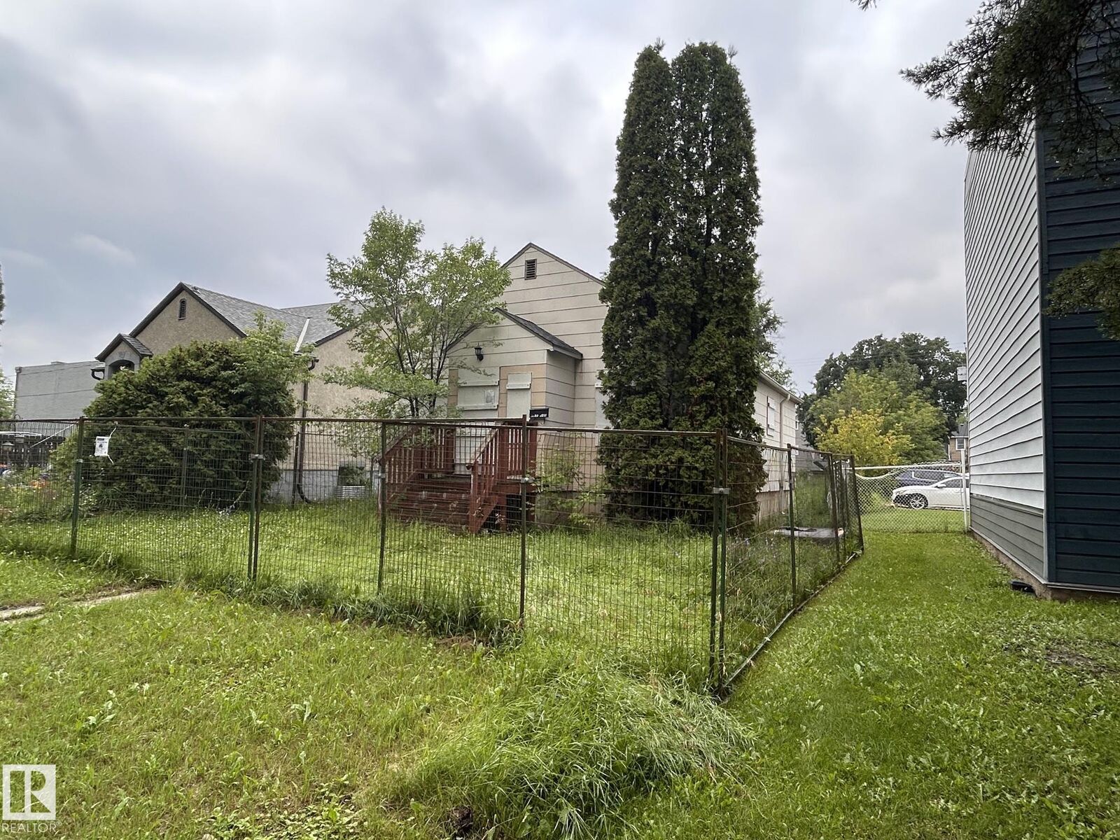 Property Photo:  10720 112 Street NW  AB T5H 3H1 