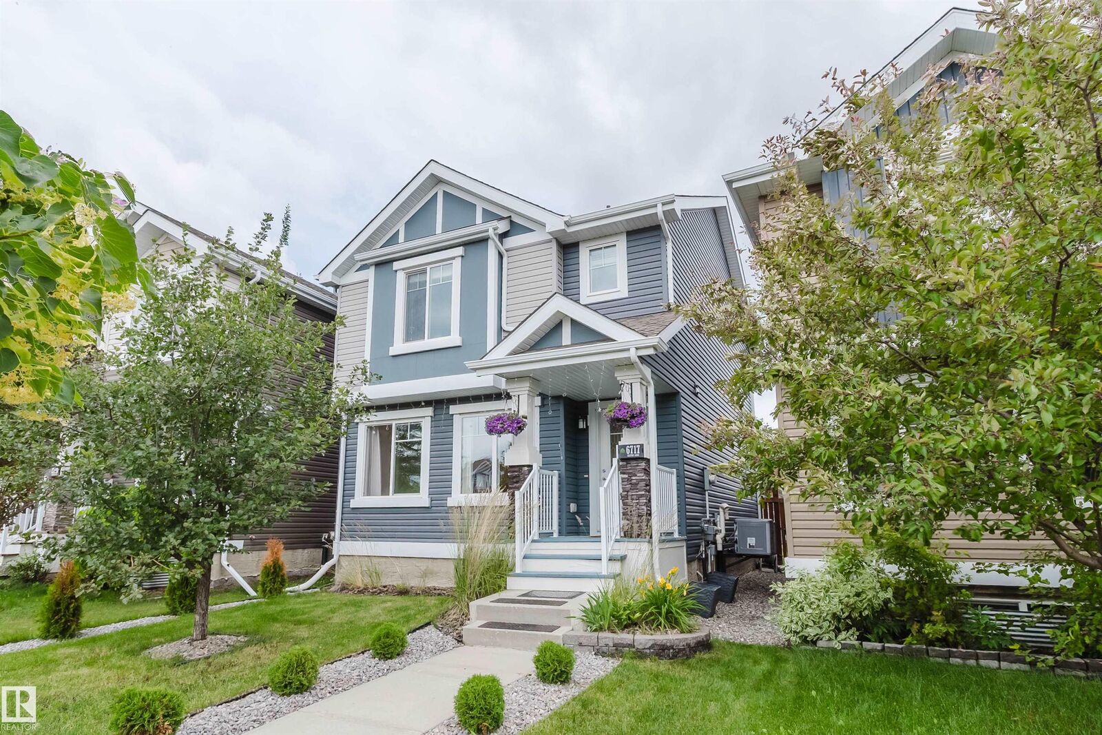 Property Photo: 6717 Elston Lane NW AB T6M 0T4