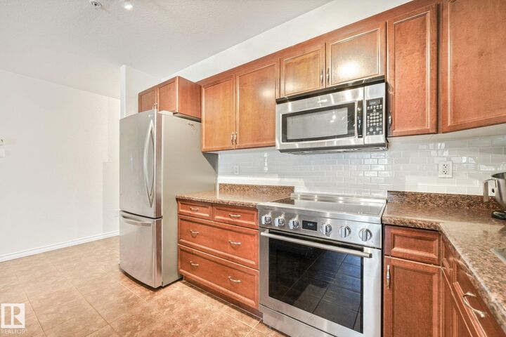 Property Photo: 1589 Glastonbury Boulevard NW 209 AB T5T 2V1