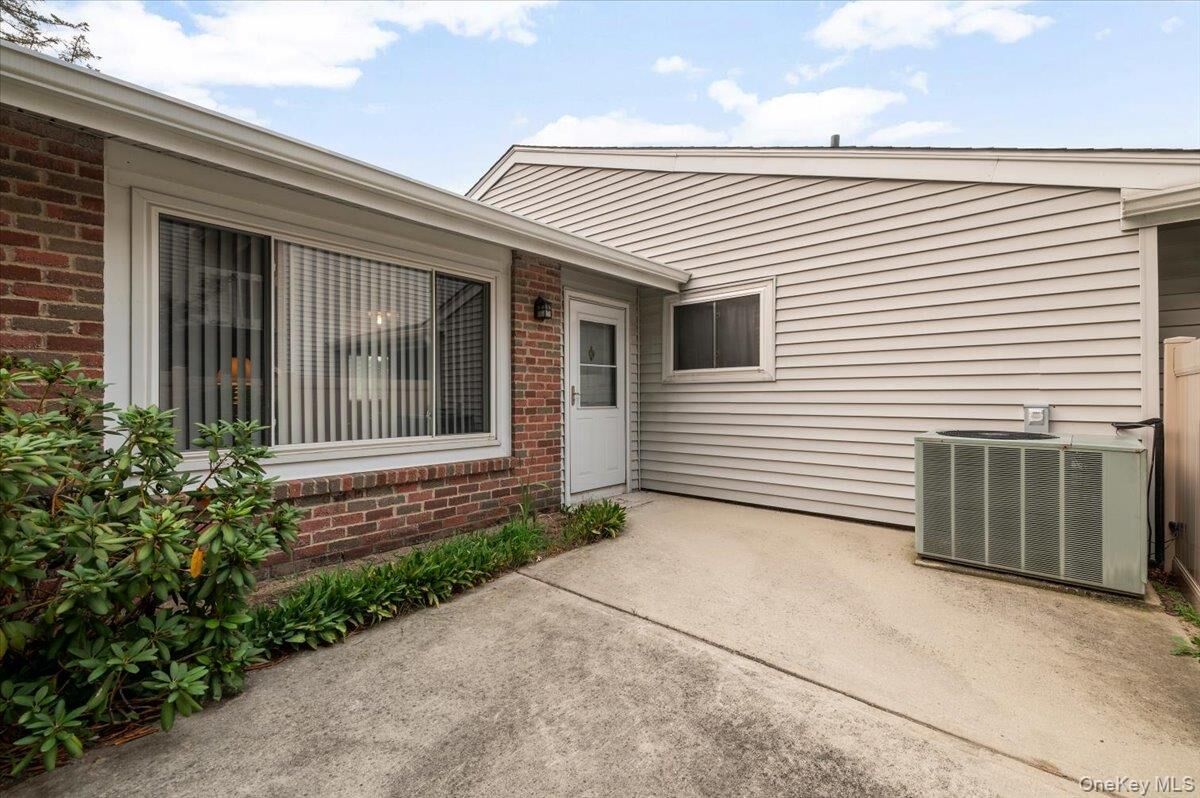 Property Photo: 221 Springmeadow Drive J NY 11741