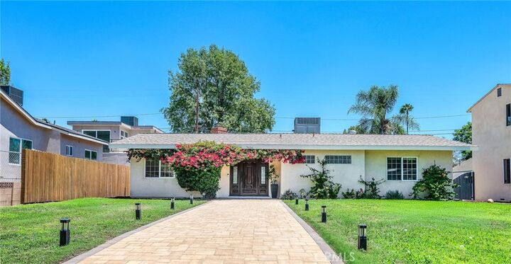Property Photo: 7656 Lasaine CA 91325