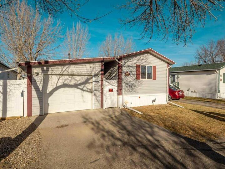 Property Photo: 206 Station Boulevard AB T1M 1P5