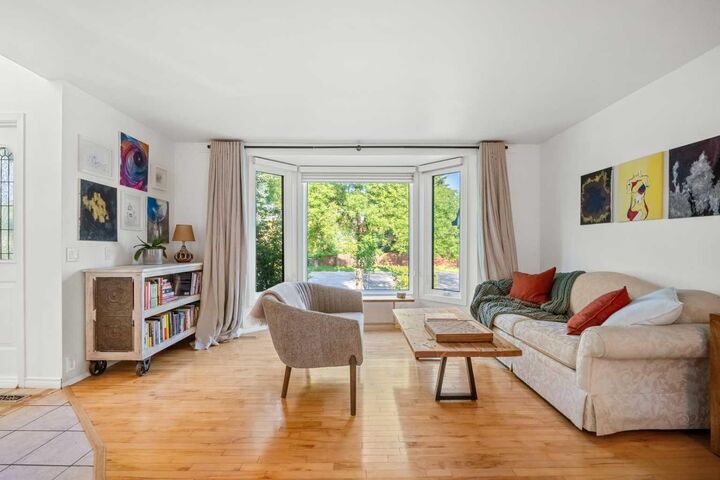 Property Photo: 148 Woodridge Drive SW AB T2W 5M2