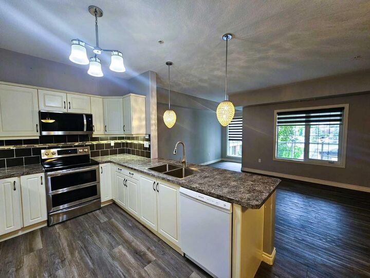 Property Photo: 6 Michener Boulevard 227 AB T4P 0K5