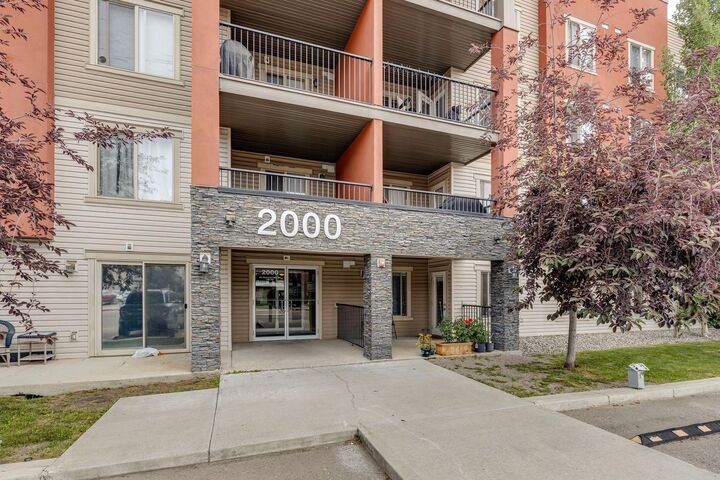 Property Photo:  403 Mackenzie Way SW 2117  AB T4B 3V7 