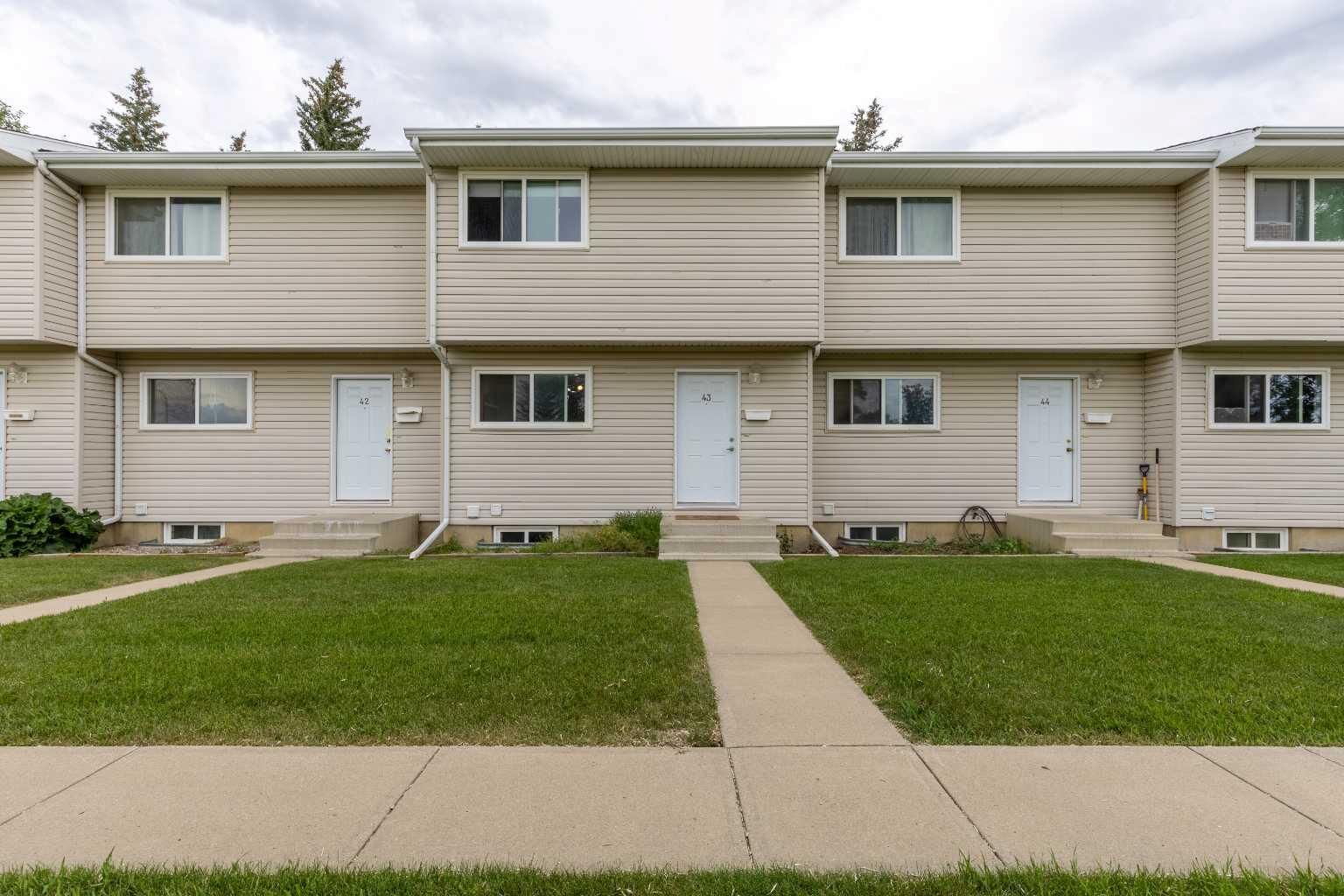 Property Photo: 55 Lemoyne Crescent W 43 AB T1K 4J7