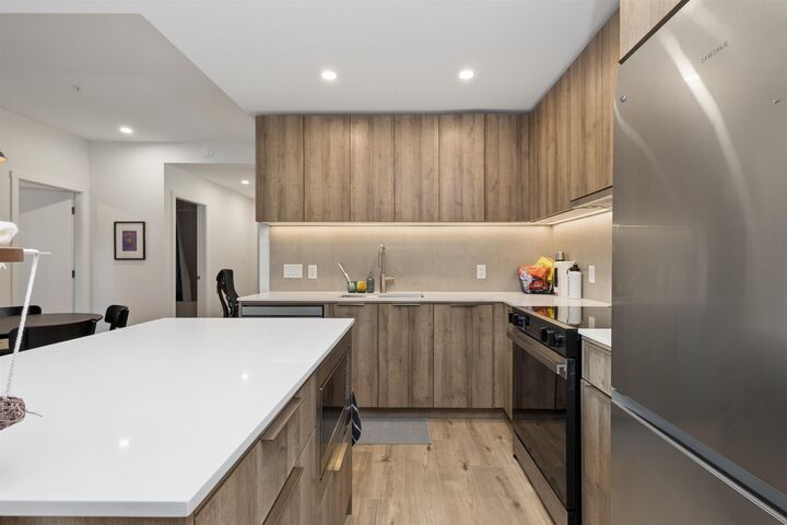 Property Photo: 3596 Malsum Drive 204 BC V7G 0B5