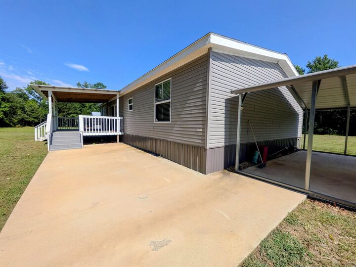 Property Photo:  12123 Highway 278  AR 71701 