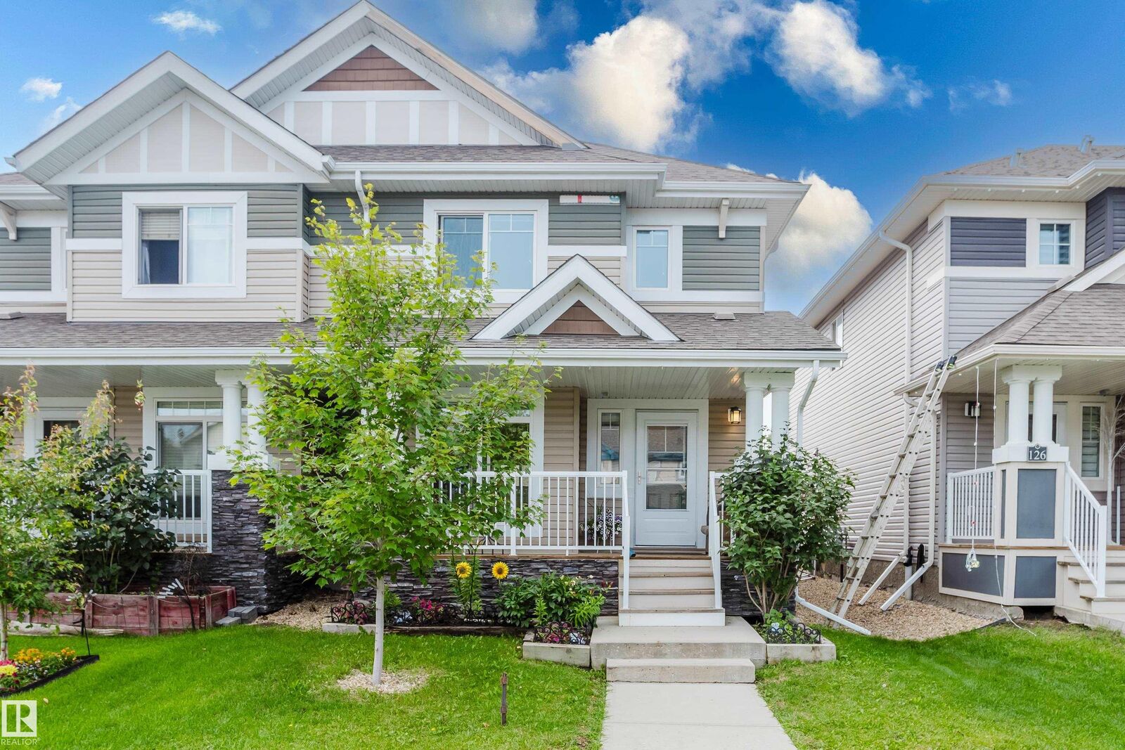 Property Photo:  124 Cy Becker Boulevard NW  AB T5Y 0X9 