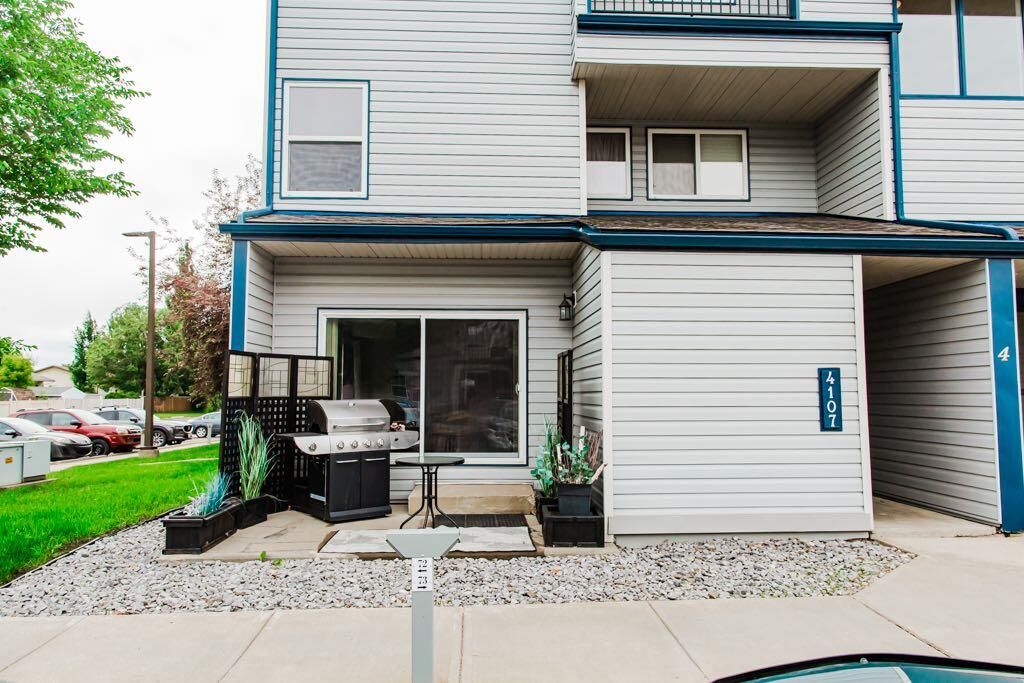 Property Photo:  7201 Poplar Drive 4107  AB T8V 6C5 