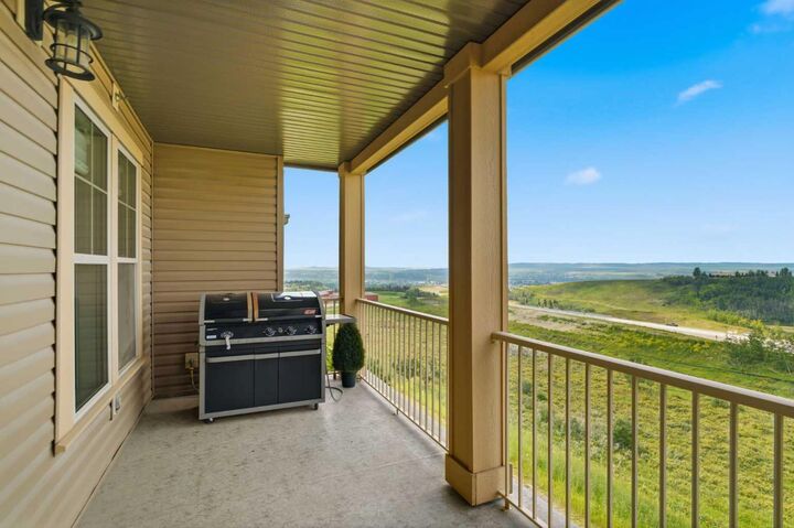 Property Photo:  207 Sunset Drive 306  AB T4C 0H7 