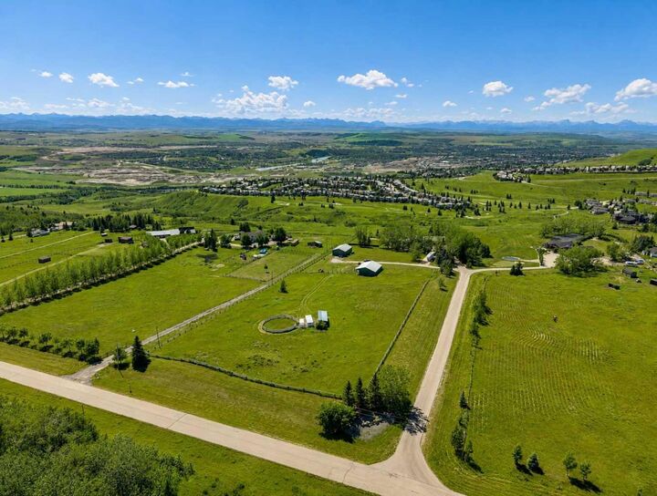 Property Photo: 260097 Mountain Ridge Place AB T4C 2Y1