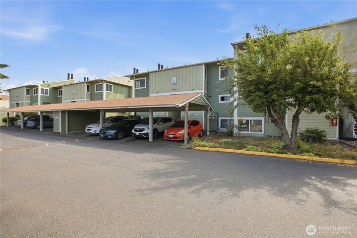 Property Photo:  22240  24th Avenue S E38  WA 98198 