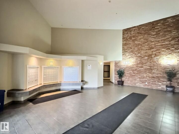Property Photo:  5350 199 Street NW 103  AB T6M 0A4 