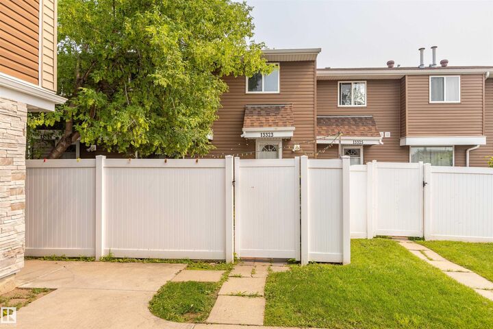 Property Photo: 13323 47 Street NW AB T5A 3L5