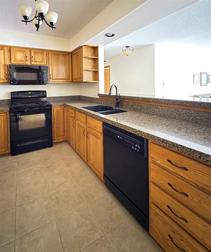 Property Photo:  409 SE Delaware Avenue 211  IA 50021 
