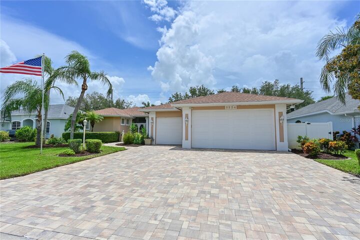 Property Photo:  5554 Magnolia Blossom Lane  FL 34233 