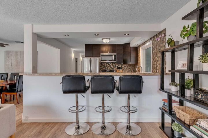 Property Photo: 6608 Bowwood Drive NW AB T3B 2G9