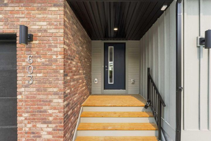 Property Photo: 201 Cooperswood Green SW 603 AB T3B 3Y6