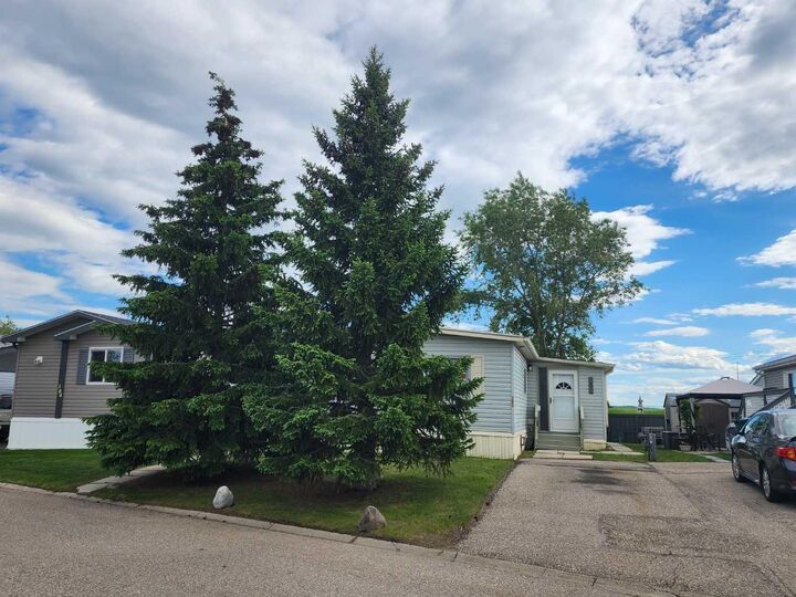 Property Photo:  99 Arbour Lake Road NW 303  AB T3G 4E4 