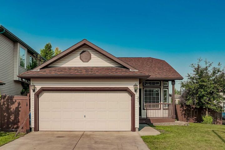 Property Photo: 31 Fairways Drive NW AB T4B 2P5