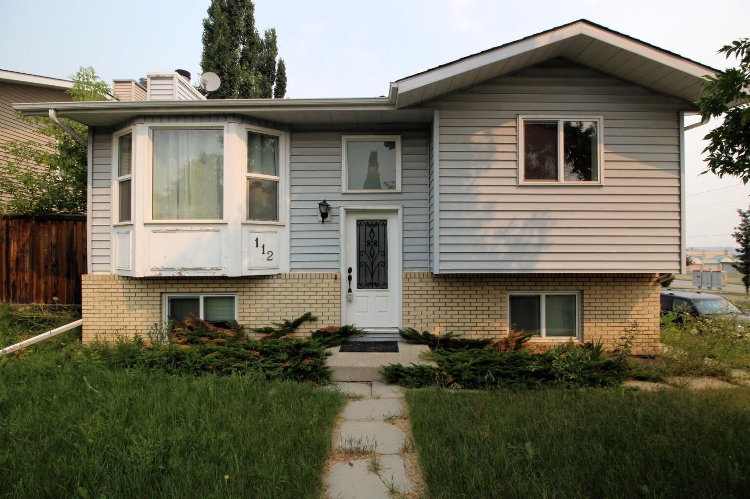 Property Photo:  112 Macewan Meadow Crescent NW  AB T3K 3H2 