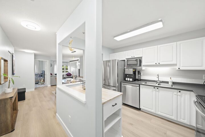 Property Photo: 20189 54 Avenue 103 BC V3A 3W2