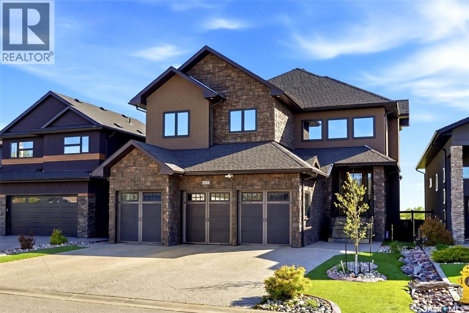 Property Photo:  7502 Lilac Place  SK S4Y 0B3 