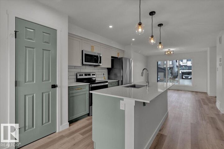 Property Photo:  18120 73 Street NW Upper  AB T5Z 0W7 