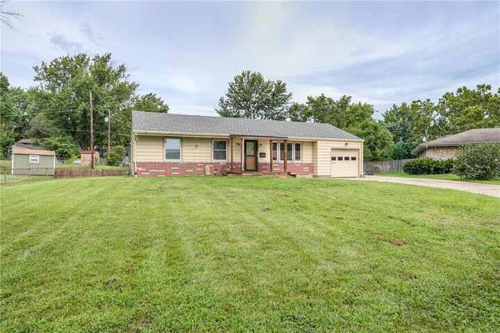 Property Photo:  3908 N Denver Court  MO 64117 