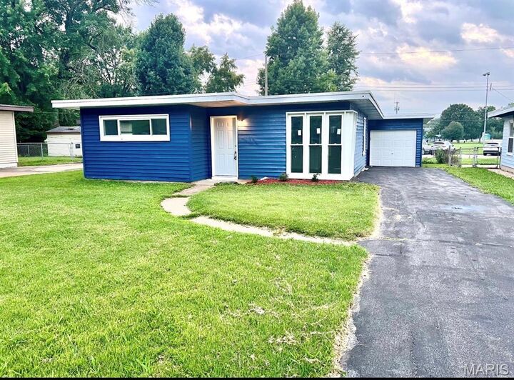 Property Photo:  1305 Saint Jean Street  MO 63031 